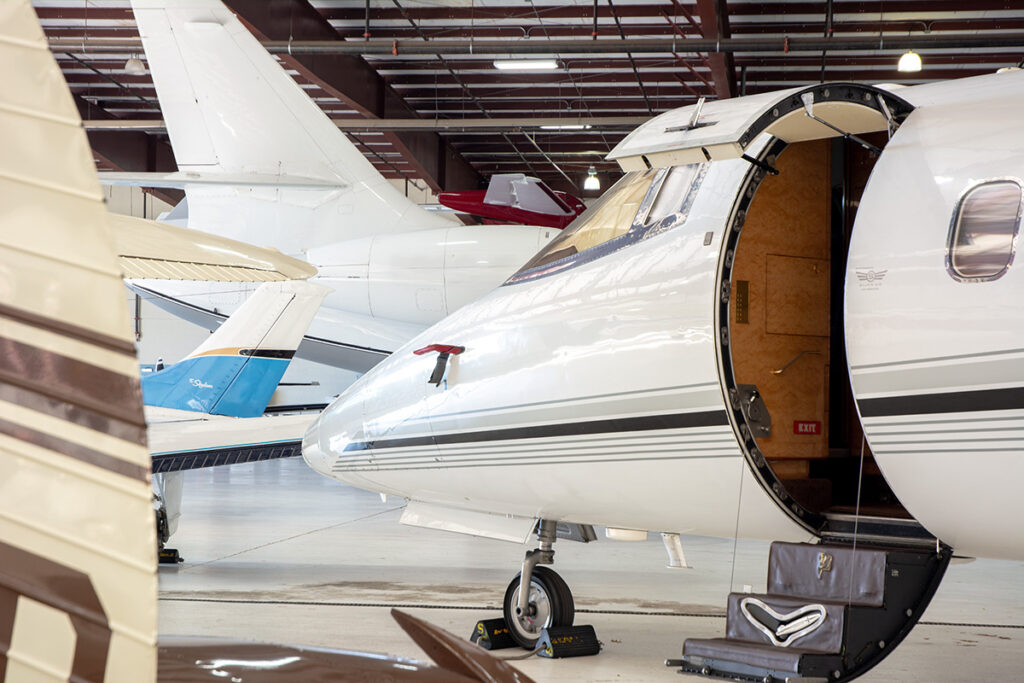 Learjet 60 with open door ready for maintenance.